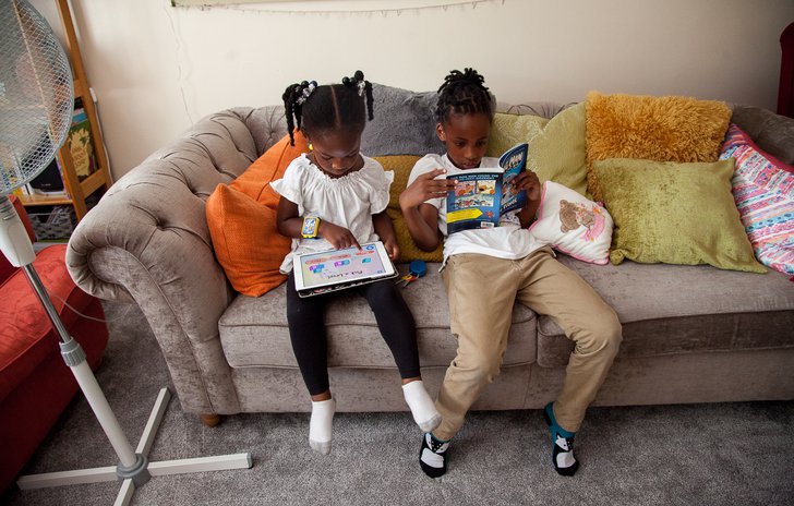 Brother and sister reading