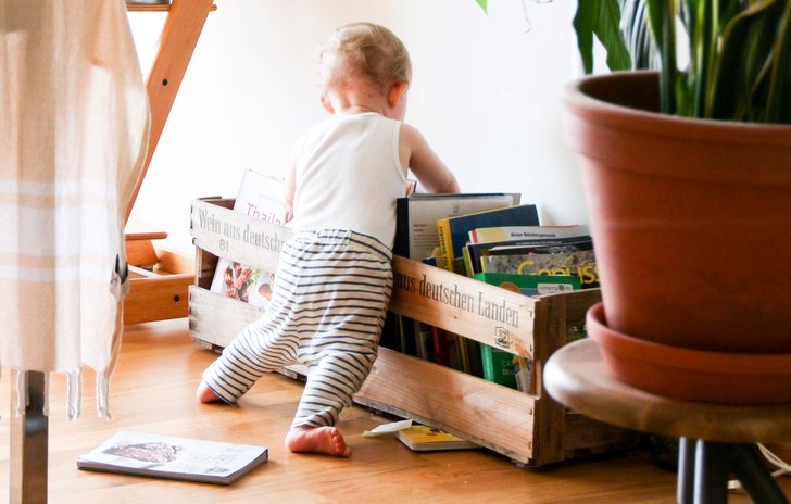 baby choosing a book