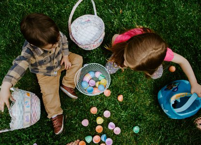 Children sharing Easter eggs