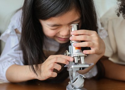 girl with microscope